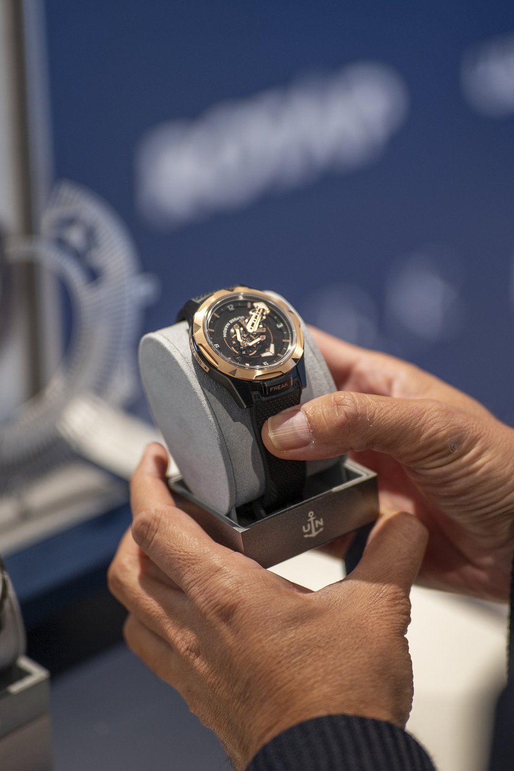 Rose gold bezel Freak X, held in hand