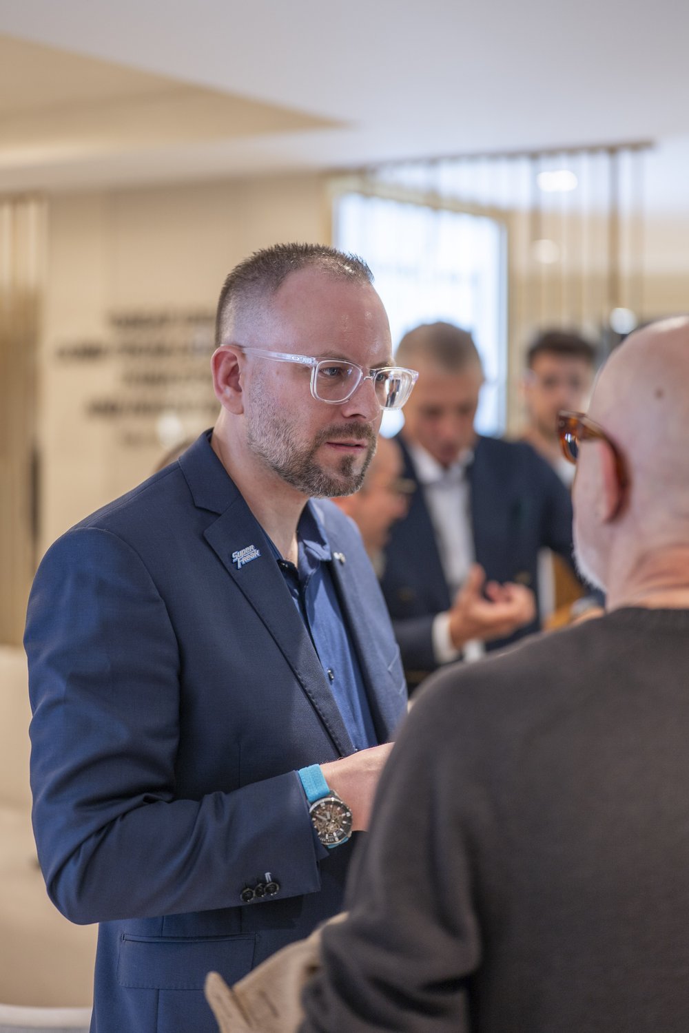 A guest in conversation at the event